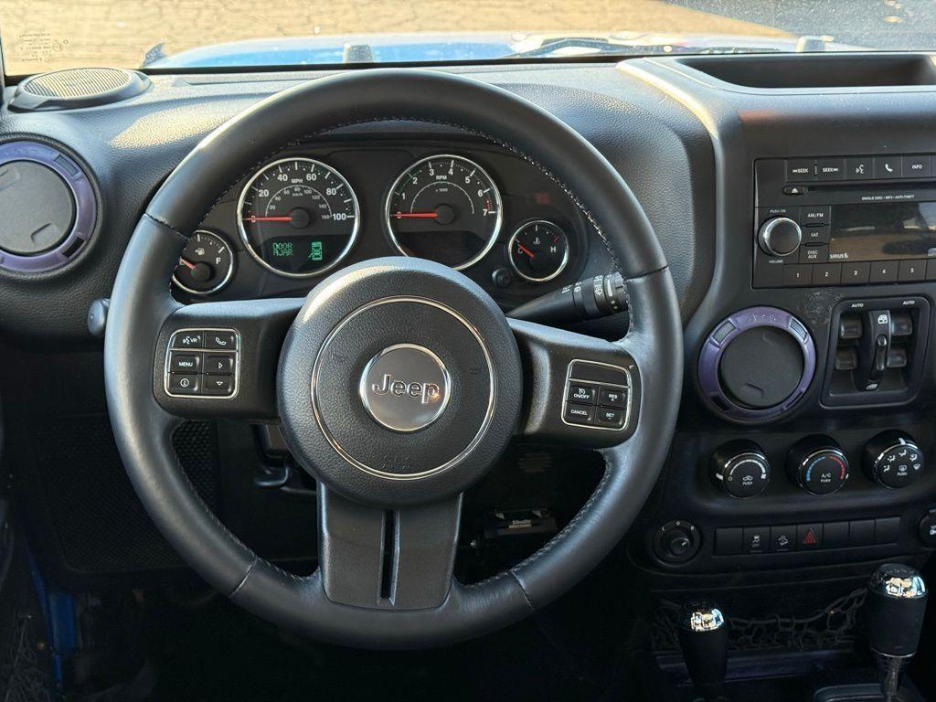 used 2015 Jeep Wrangler Unlimited car, priced at $15,229