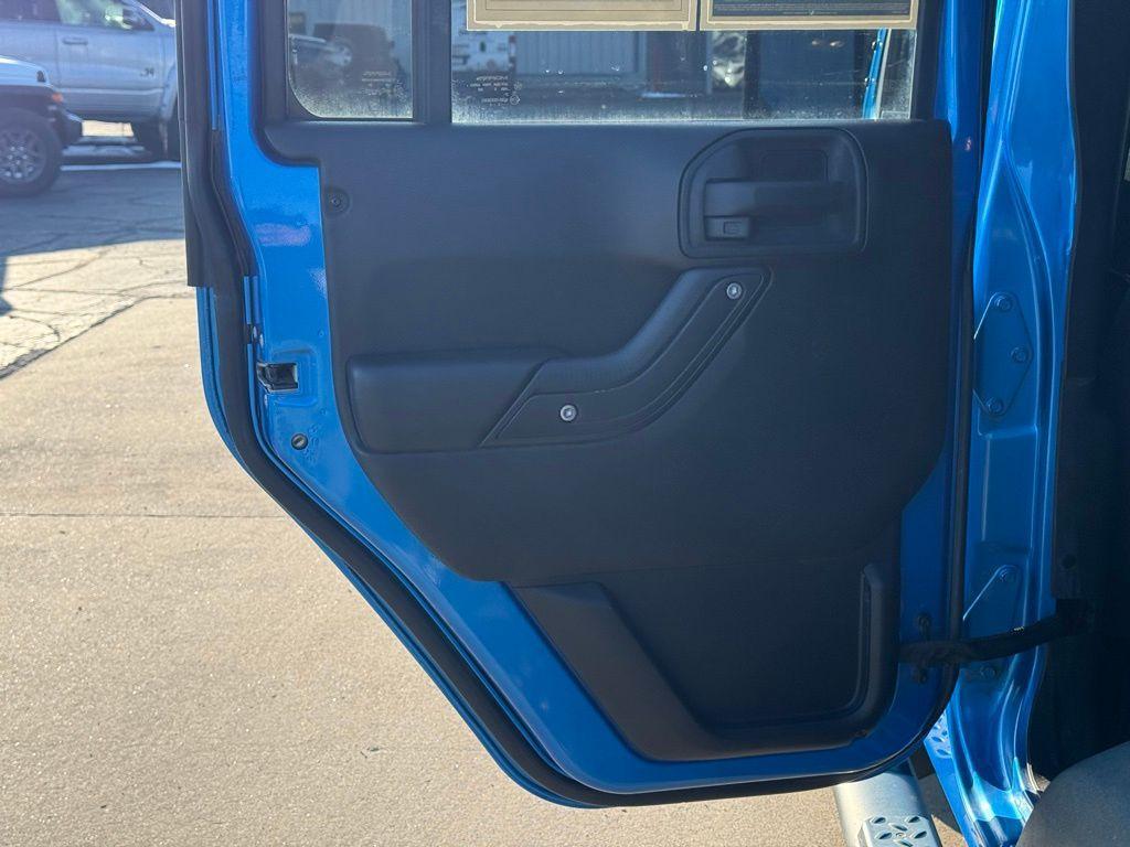 used 2015 Jeep Wrangler Unlimited car, priced at $15,229