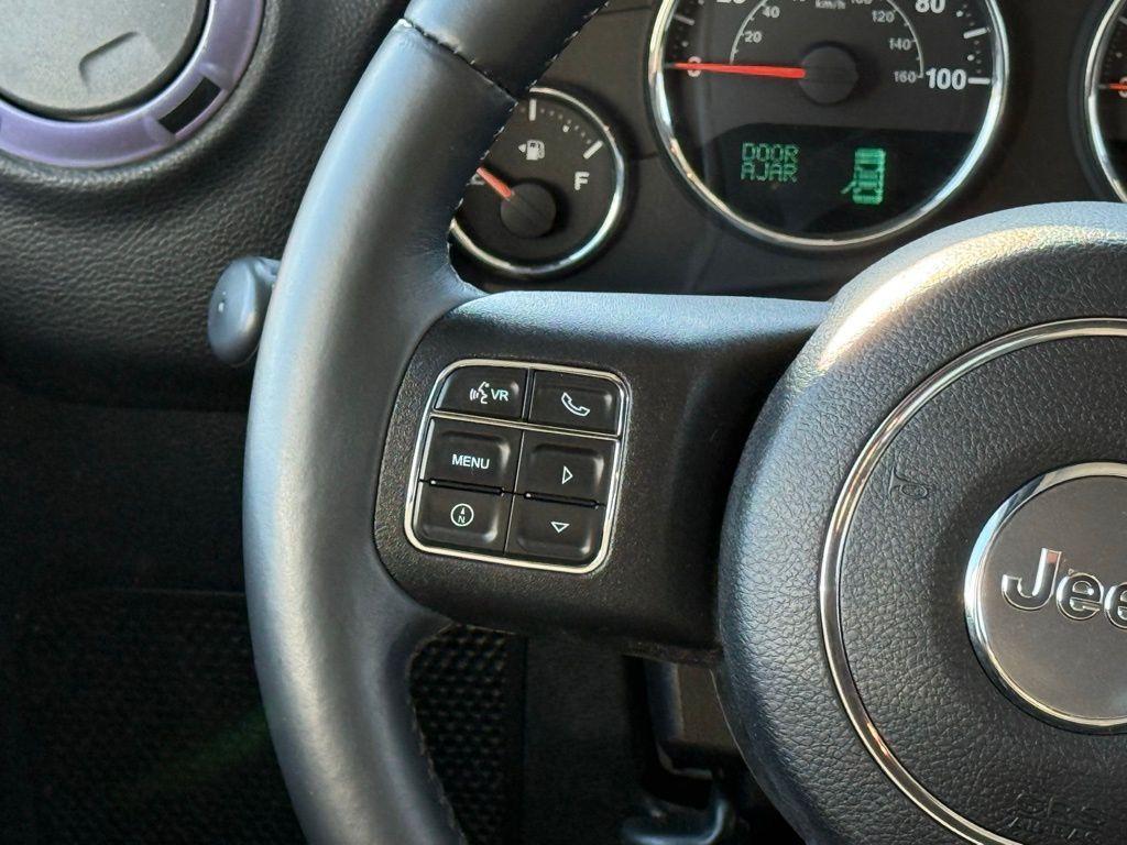 used 2015 Jeep Wrangler Unlimited car, priced at $15,229