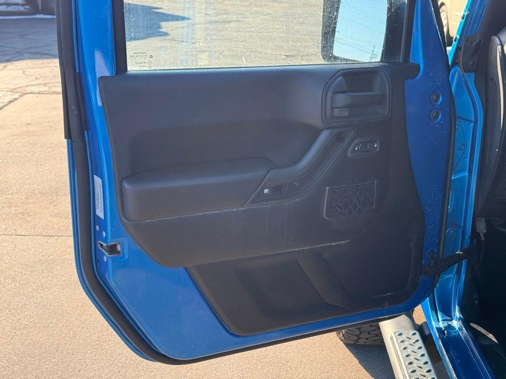 used 2015 Jeep Wrangler Unlimited car, priced at $15,229