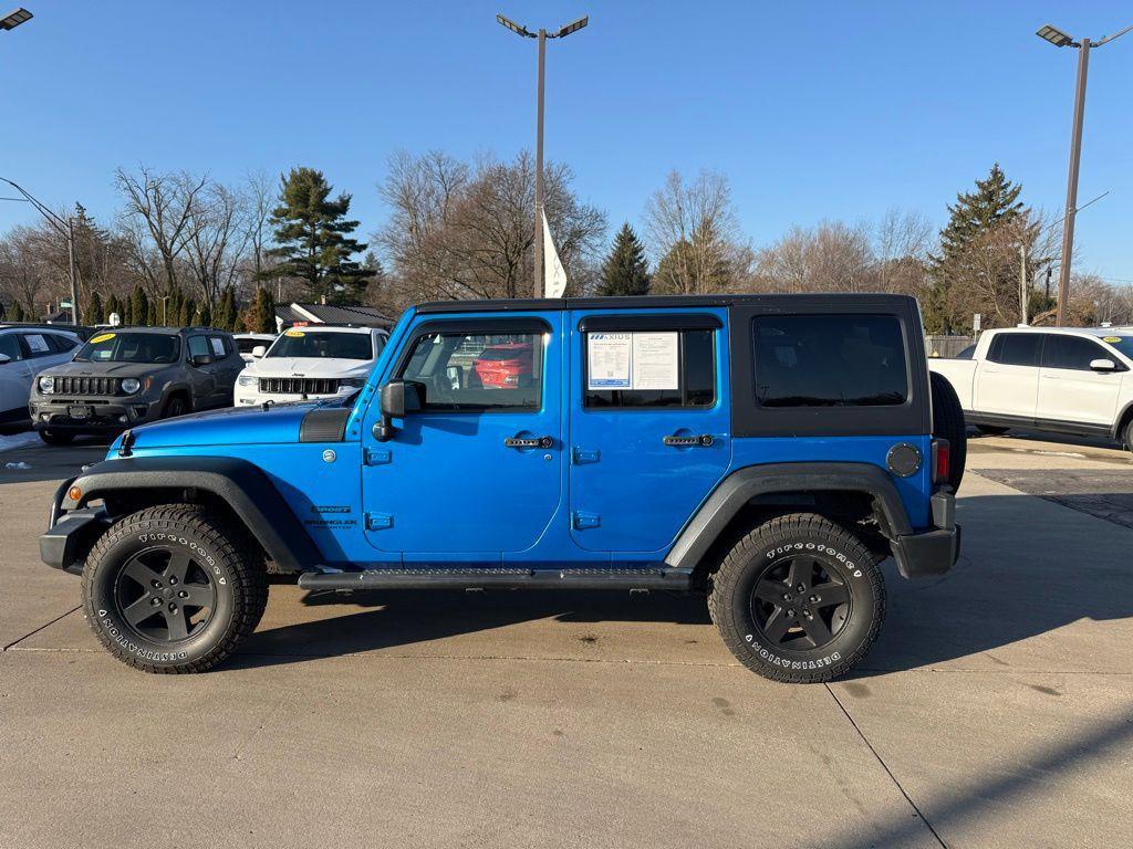 used 2015 Jeep Wrangler Unlimited car, priced at $15,229