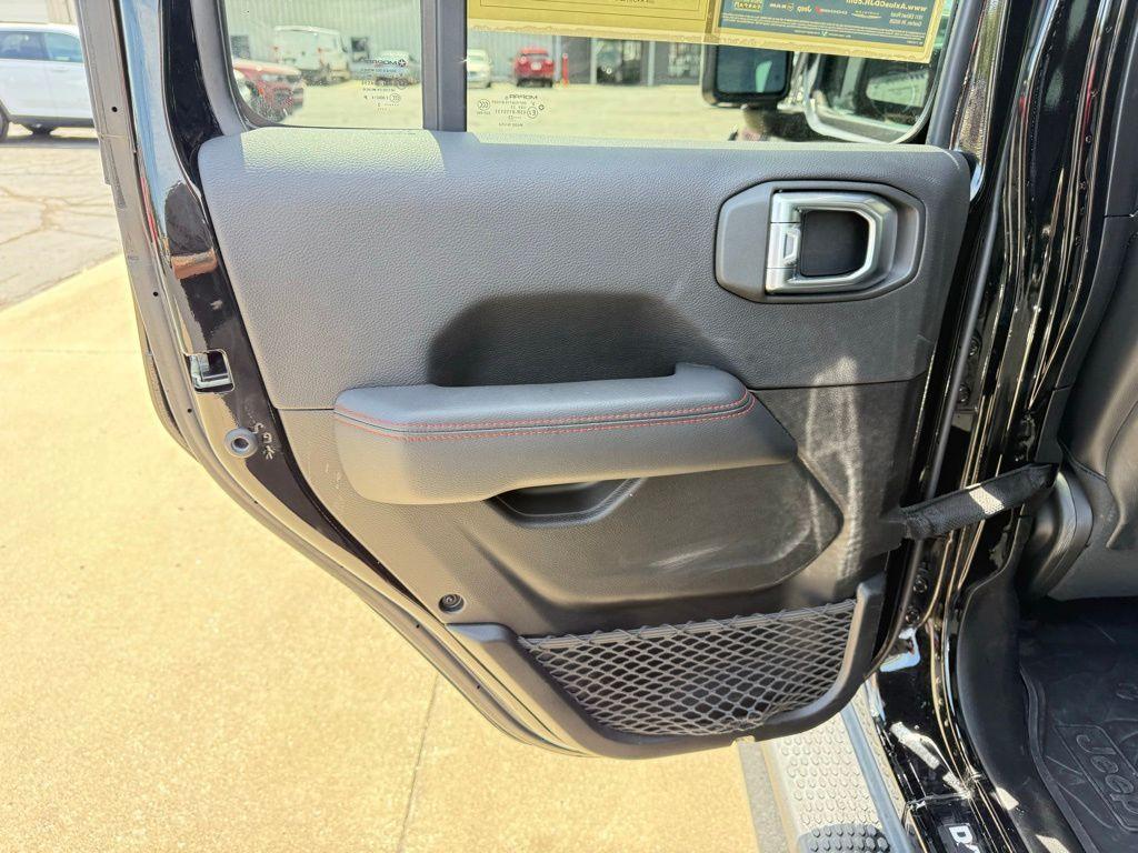 used 2023 Jeep Wrangler car, priced at $39,196