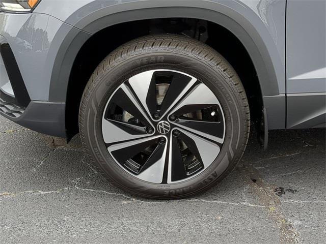 new 2024 Volkswagen Taos car, priced at $28,911