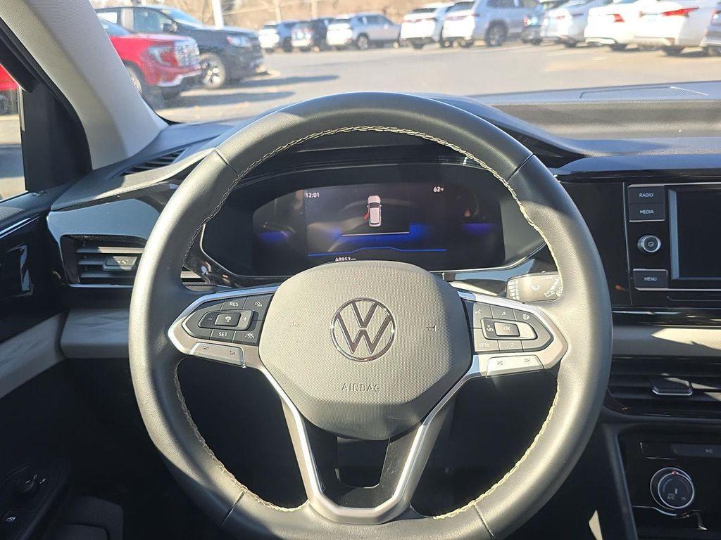 used 2024 Volkswagen Taos car, priced at $16,888