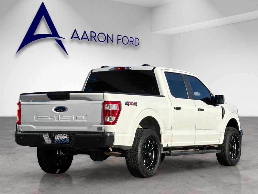 used 2021 Ford F-150 car, priced at $23,454