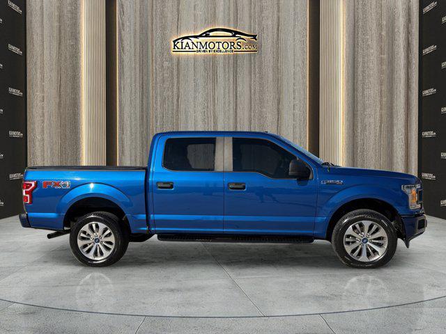 used 2018 Ford F-150 car, priced at $16,488