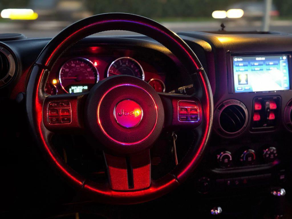 used 2016 Jeep Wrangler Unlimited car, priced at $21,995