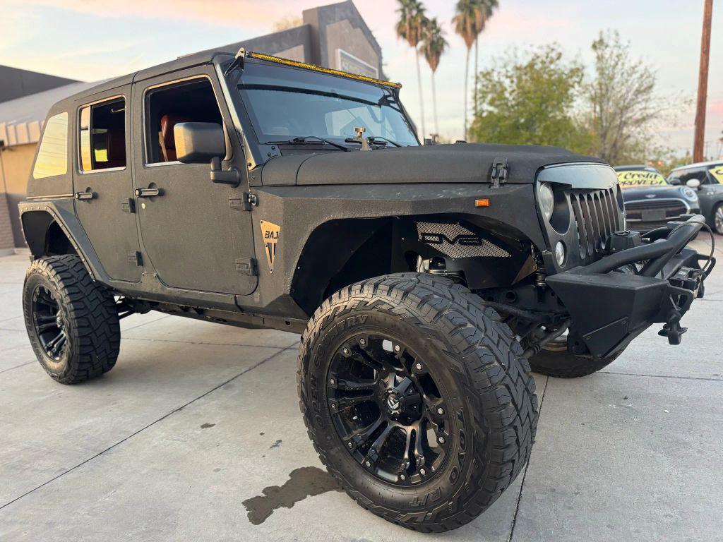 used 2016 Jeep Wrangler Unlimited car, priced at $21,995