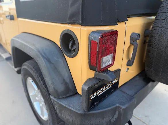 used 2014 Jeep Wrangler Unlimited car, priced at $18,995