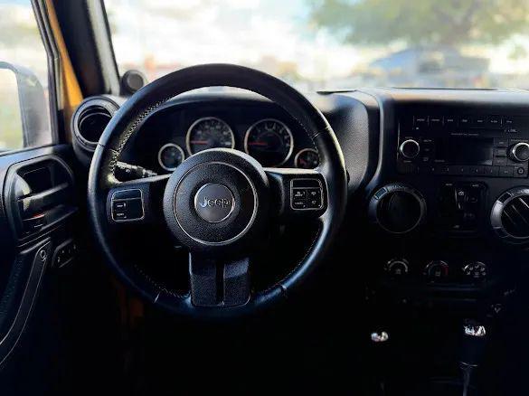 used 2014 Jeep Wrangler Unlimited car, priced at $18,995