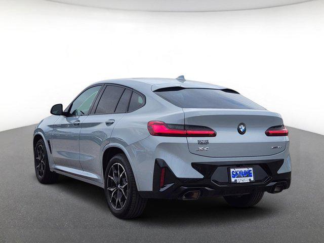 used 2025 BMW X4 car, priced at $53,372