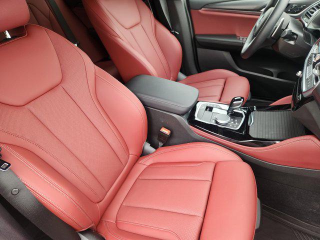 used 2025 BMW X4 car, priced at $53,372
