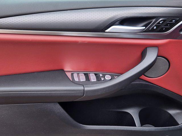 used 2025 BMW X4 car, priced at $53,372