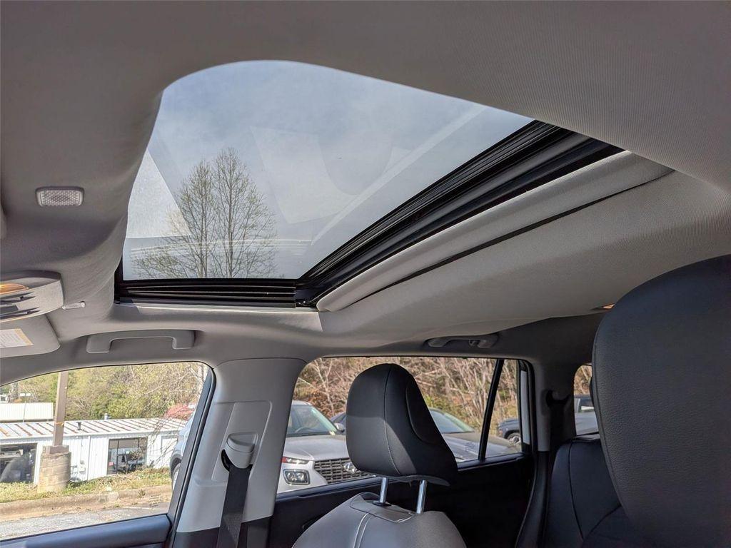 used 2024 Toyota Highlander Hybrid car, priced at $42,498