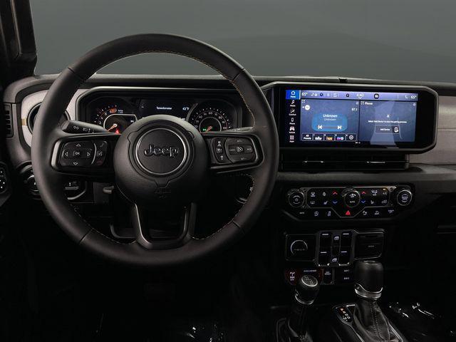 used 2024 Jeep Wrangler car, priced at $38,400