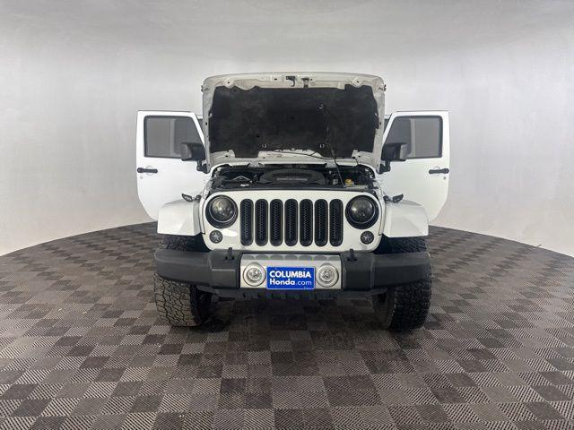 used 2015 Jeep Wrangler Unlimited car, priced at $15,900