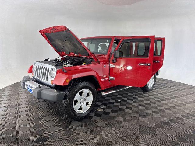 used 2012 Jeep Wrangler Unlimited car, priced at $14,000