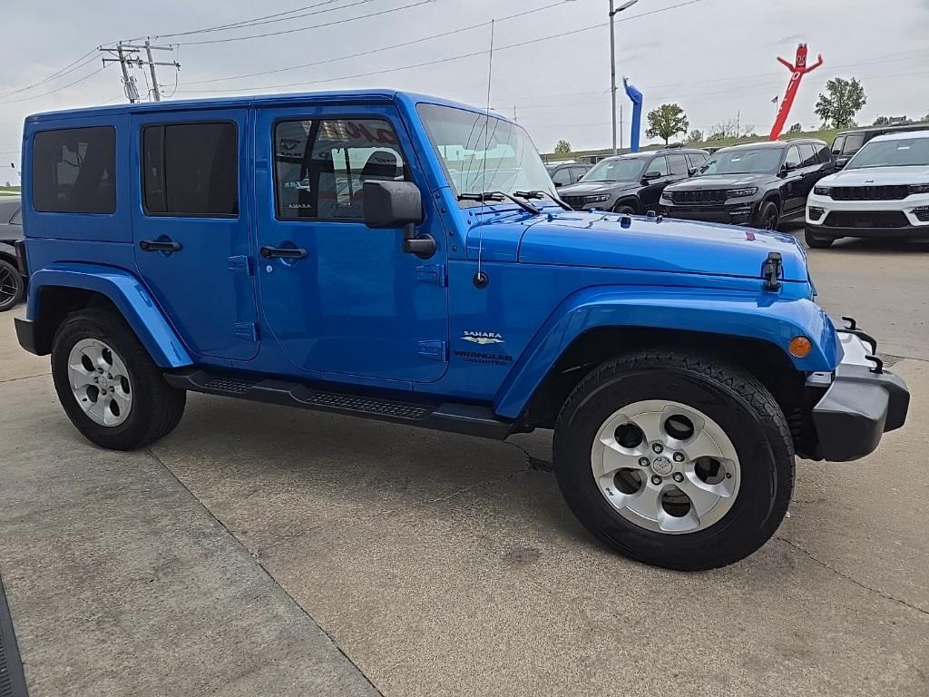 used 2015 Jeep Wrangler Unlimited car, priced at $16,900