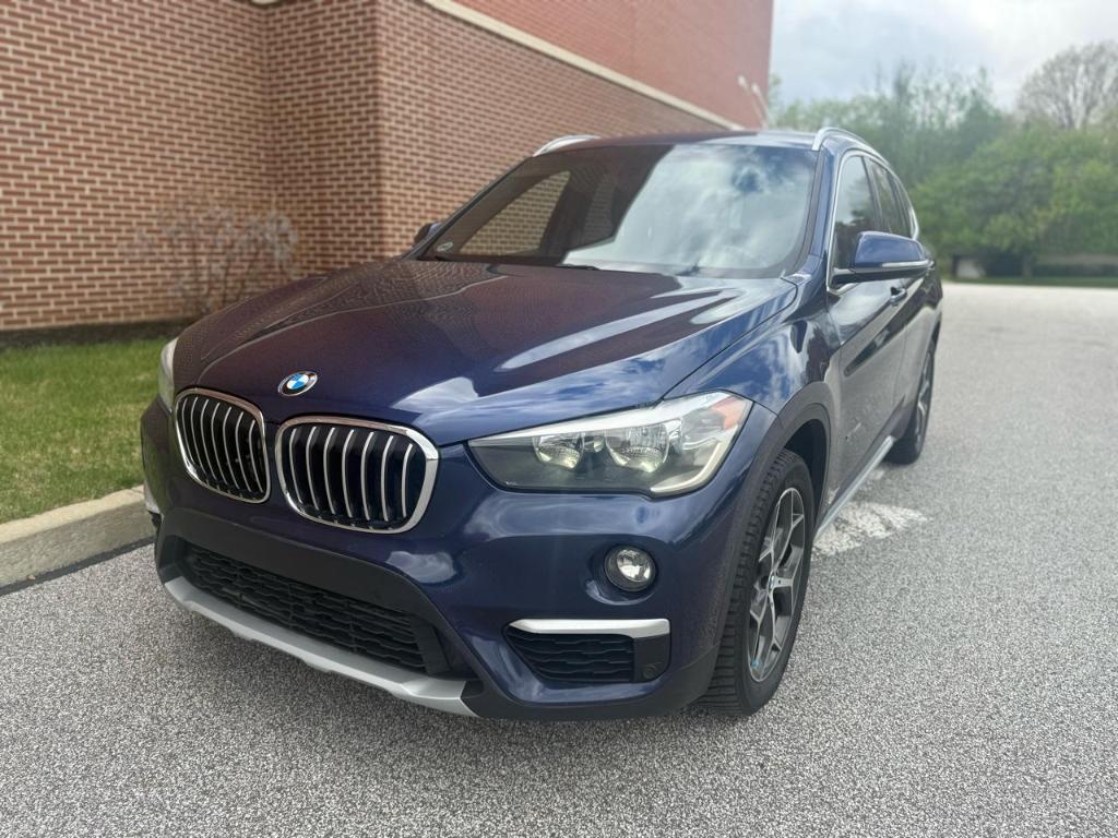used 2018 BMW X1 car, priced at $12,991