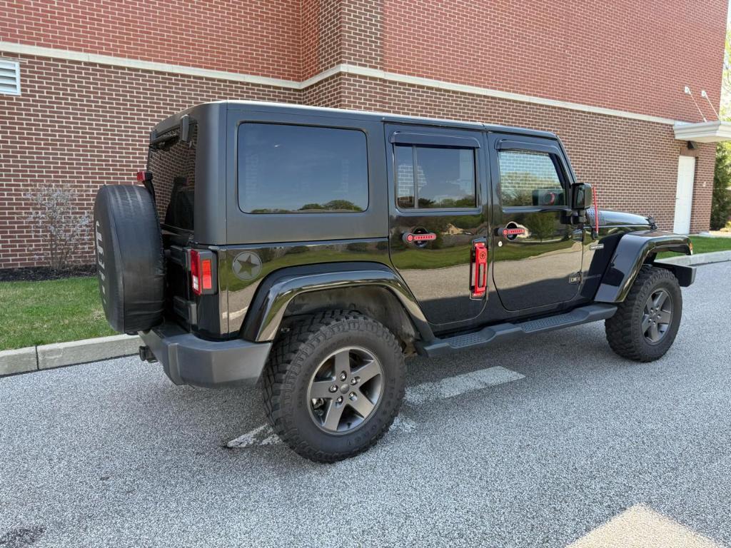 used 2016 Jeep Wrangler Unlimited car, priced at $10,985