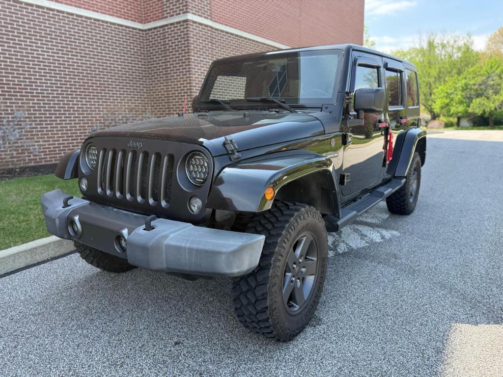 used 2016 Jeep Wrangler Unlimited car, priced at $10,985
