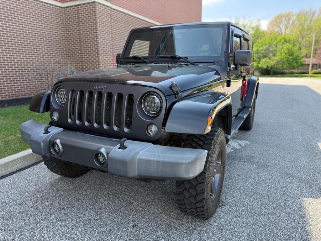 used 2016 Jeep Wrangler Unlimited car, priced at $10,985