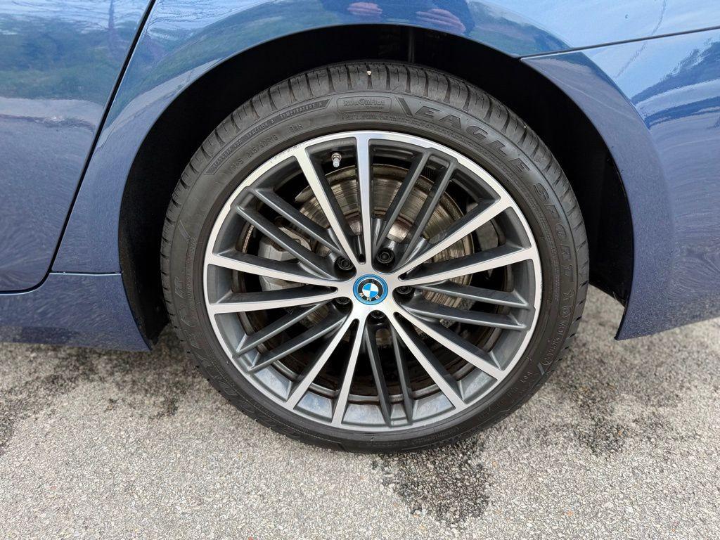 used 2023 BMW 530e car, priced at $39,174