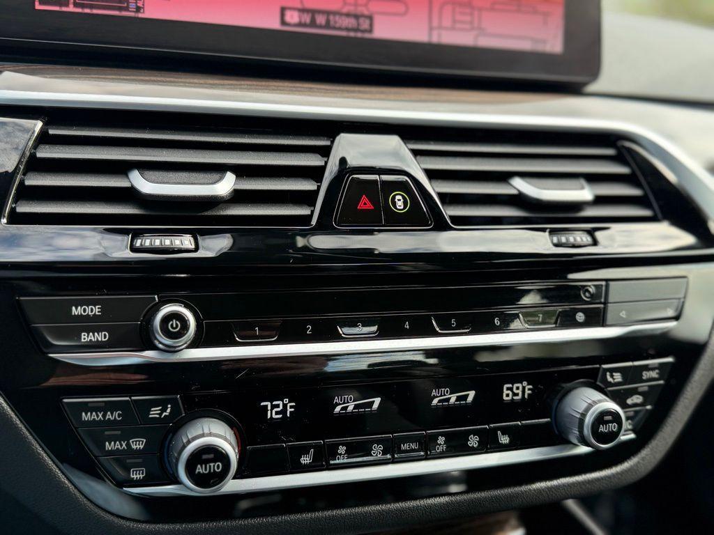 used 2023 BMW 530e car, priced at $39,174
