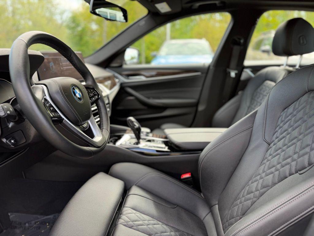 used 2023 BMW 530e car, priced at $39,174