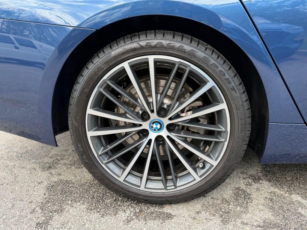 used 2023 BMW 530e car, priced at $39,174