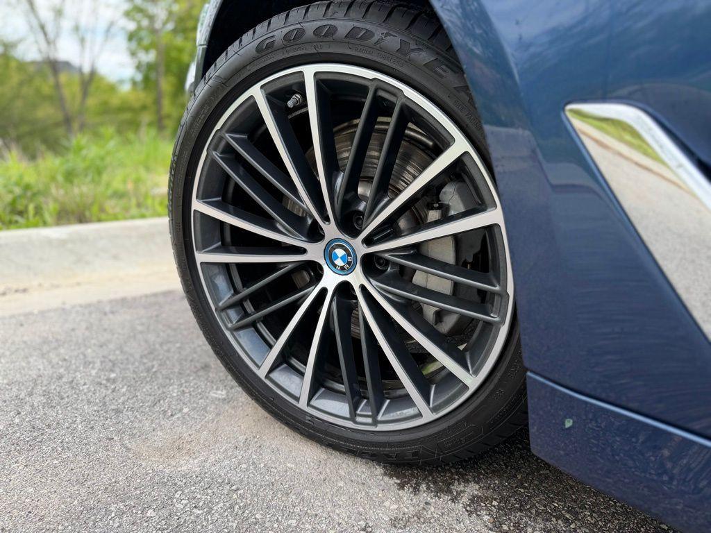 used 2023 BMW 530e car, priced at $39,174