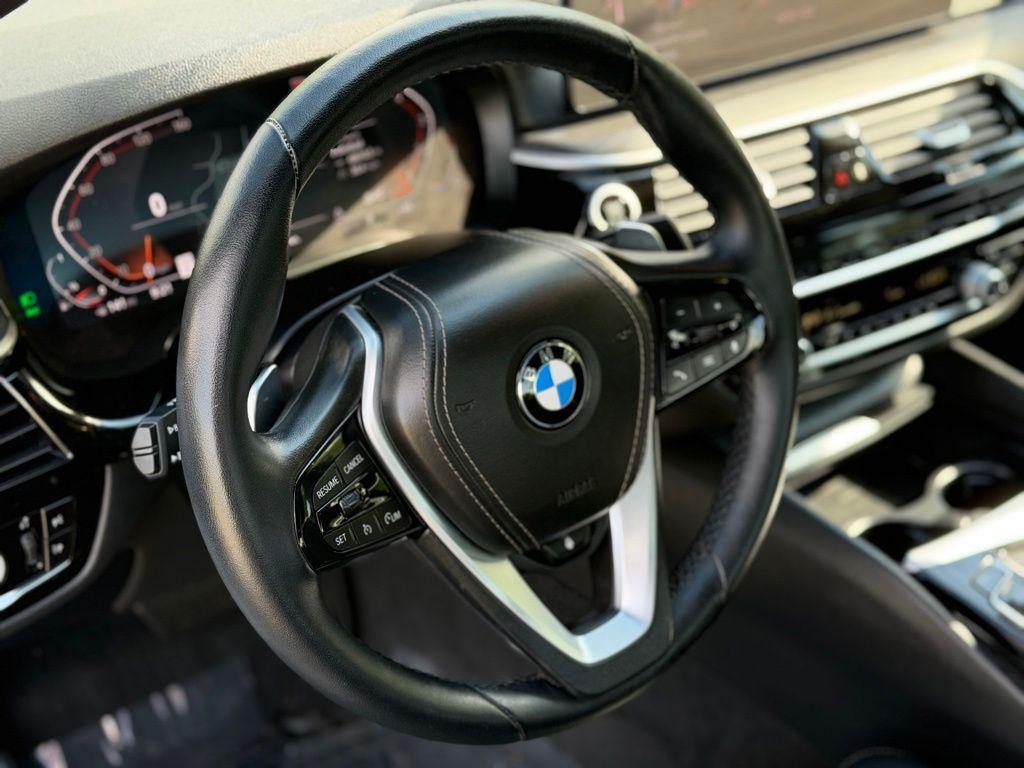 used 2023 BMW 530 car, priced at $35,493