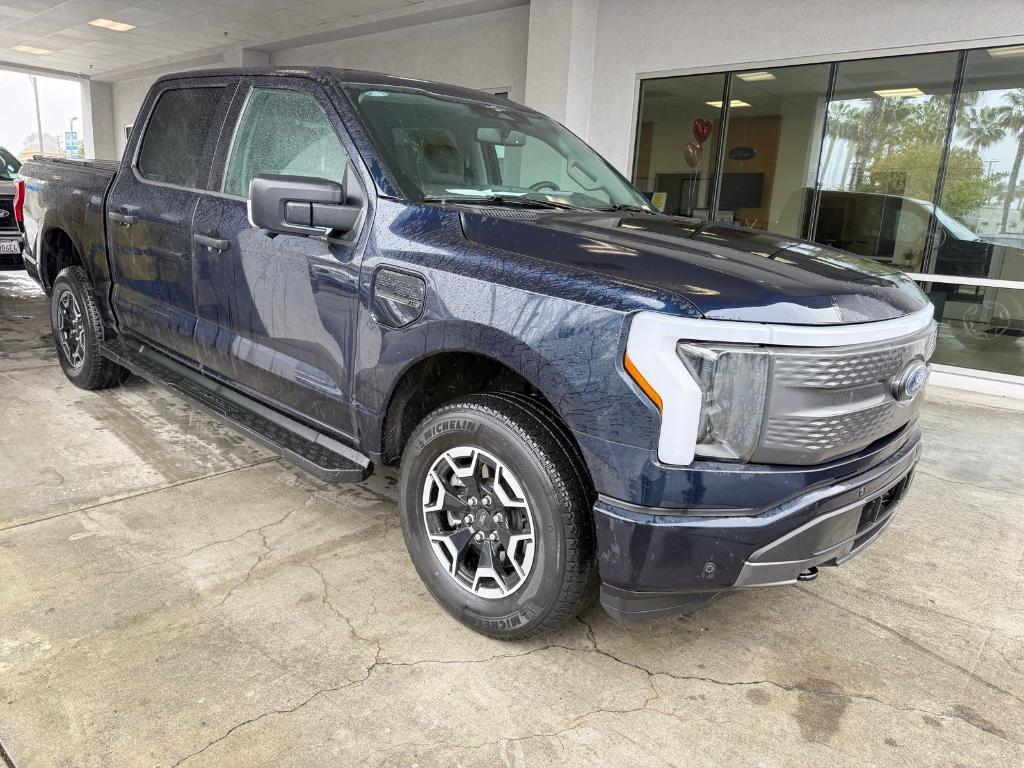 used 2023 Ford F-150 Lightning car, priced at $38,900
