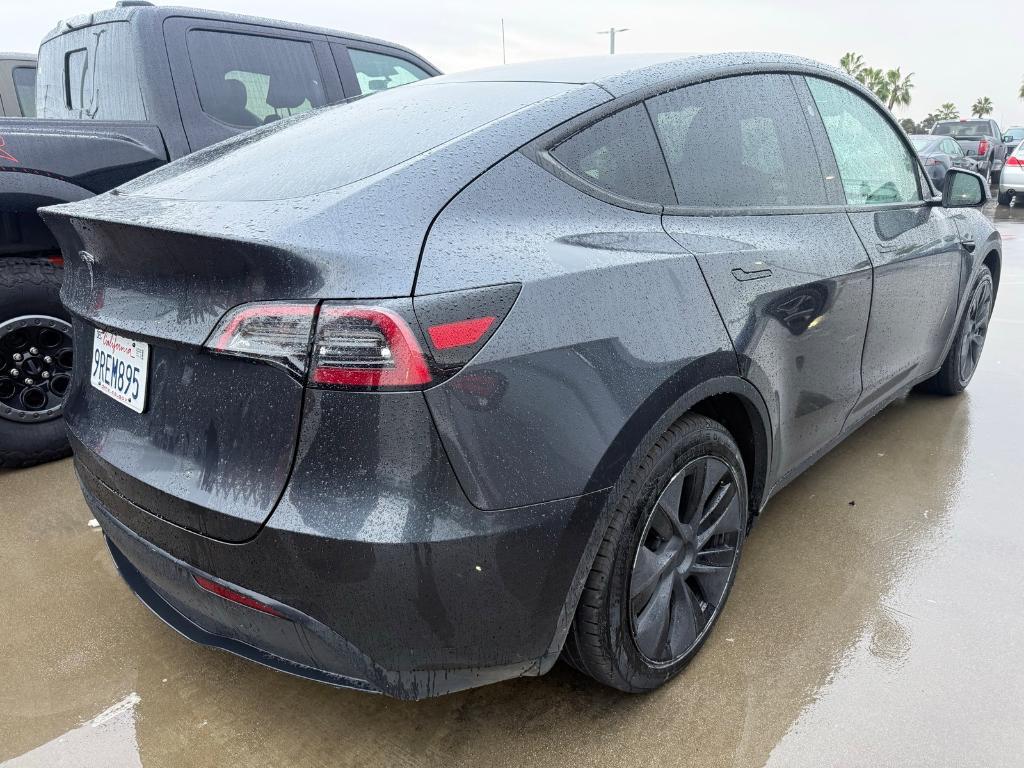 used 2025 Tesla Model Y car, priced at $37,277