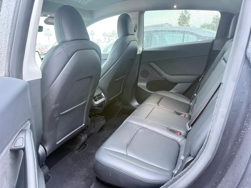 used 2025 Tesla Model Y car, priced at $37,277