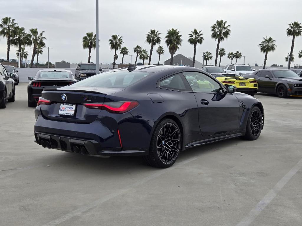 used 2022 BMW M4 car, priced at $66,875