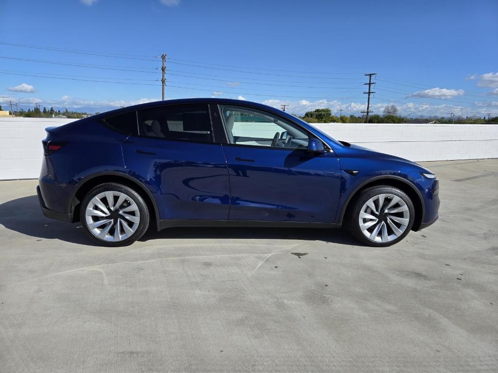 used 2026 Tesla Model Y car, priced at $47,099