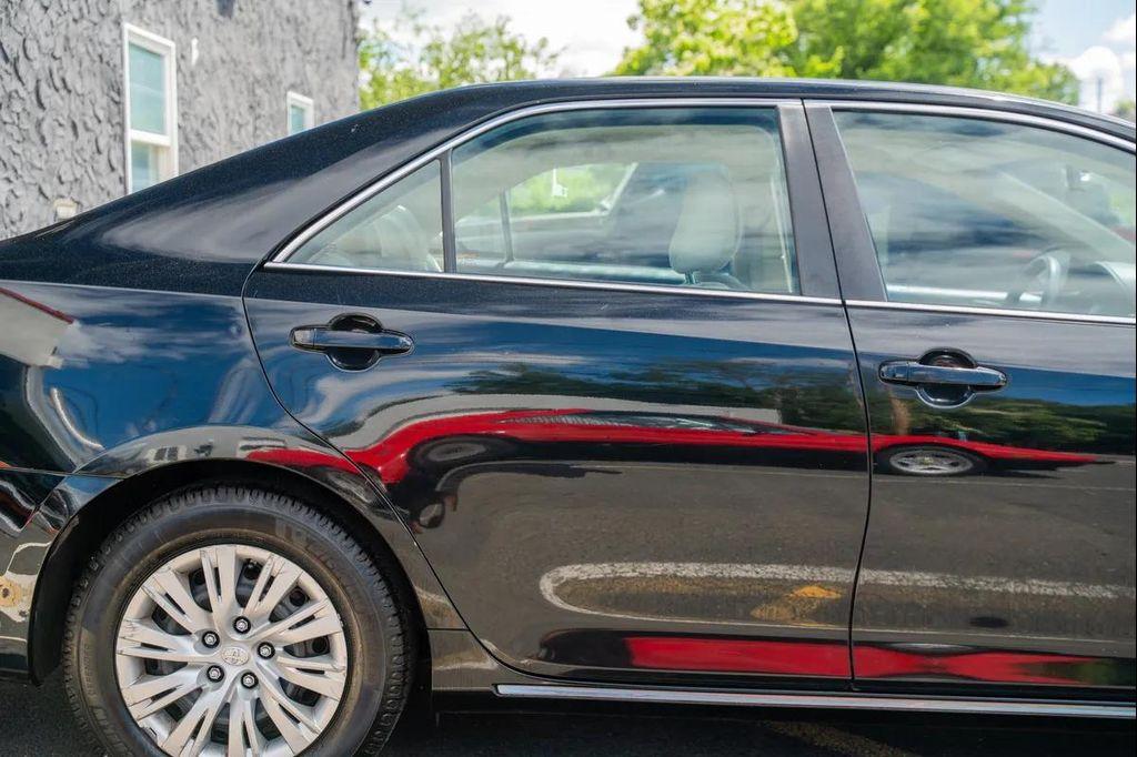 used 2014 Toyota Camry car, priced at $10,998