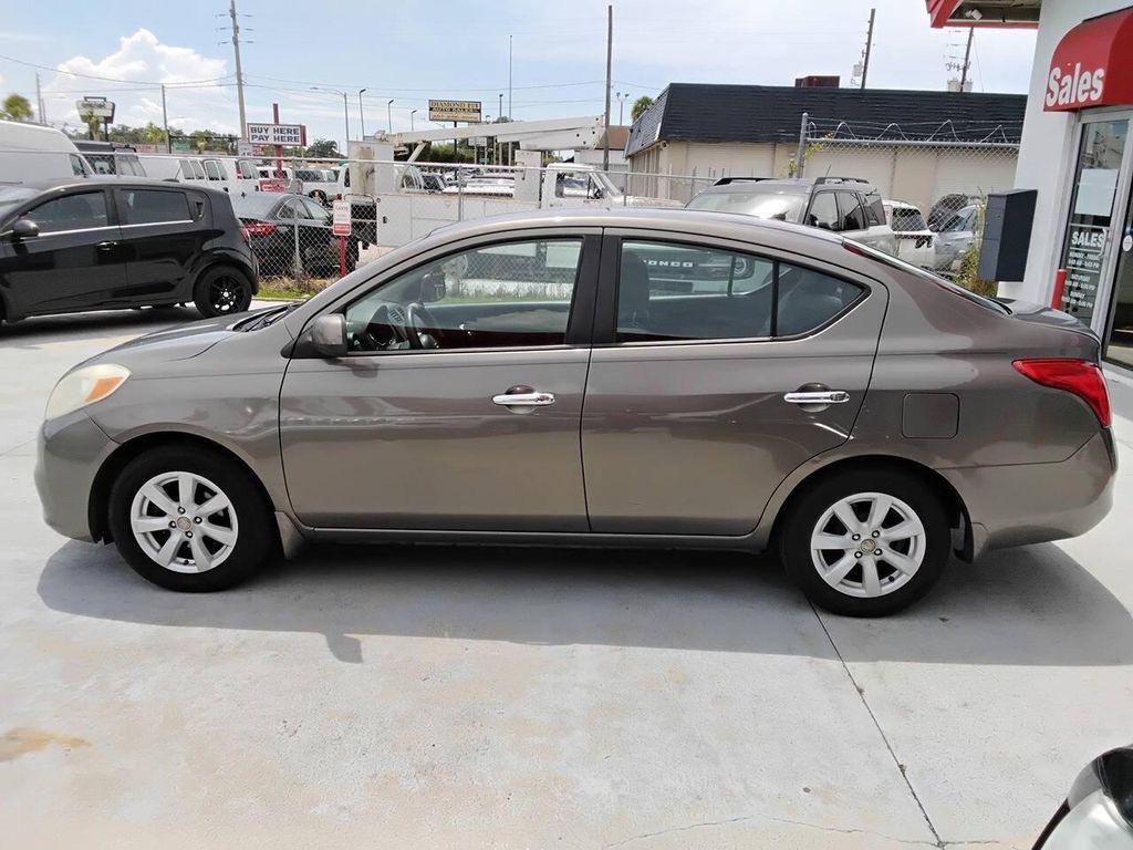 used 2012 Nissan Versa car, priced at $2,900