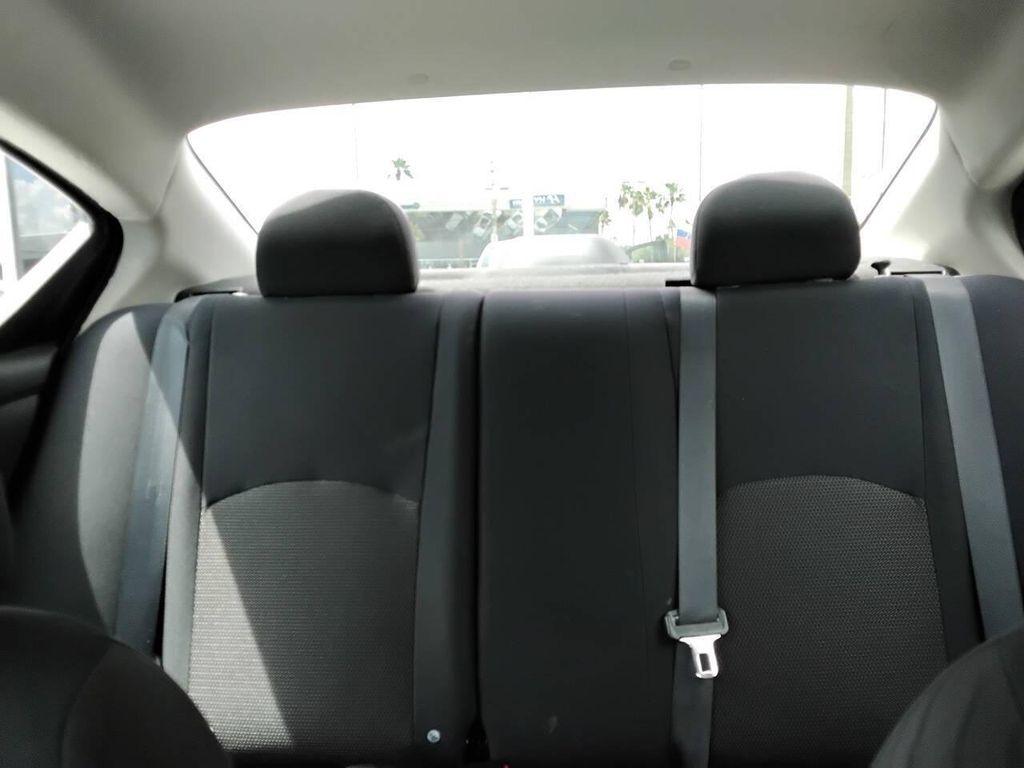 used 2012 Nissan Versa car, priced at $2,900
