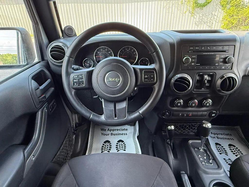 used 2014 Jeep Wrangler Unlimited car, priced at $15,804