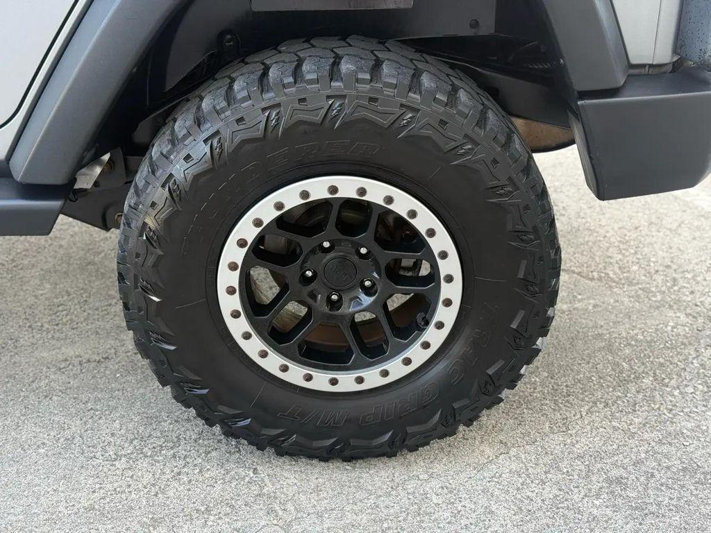 used 2014 Jeep Wrangler Unlimited car, priced at $15,804