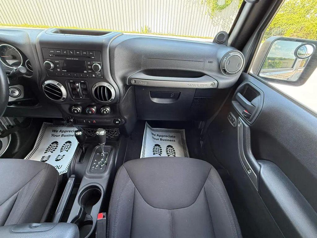 used 2014 Jeep Wrangler Unlimited car, priced at $15,804