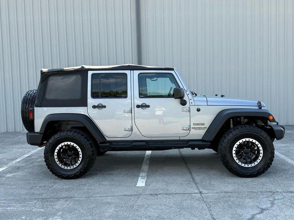used 2014 Jeep Wrangler Unlimited car, priced at $15,804