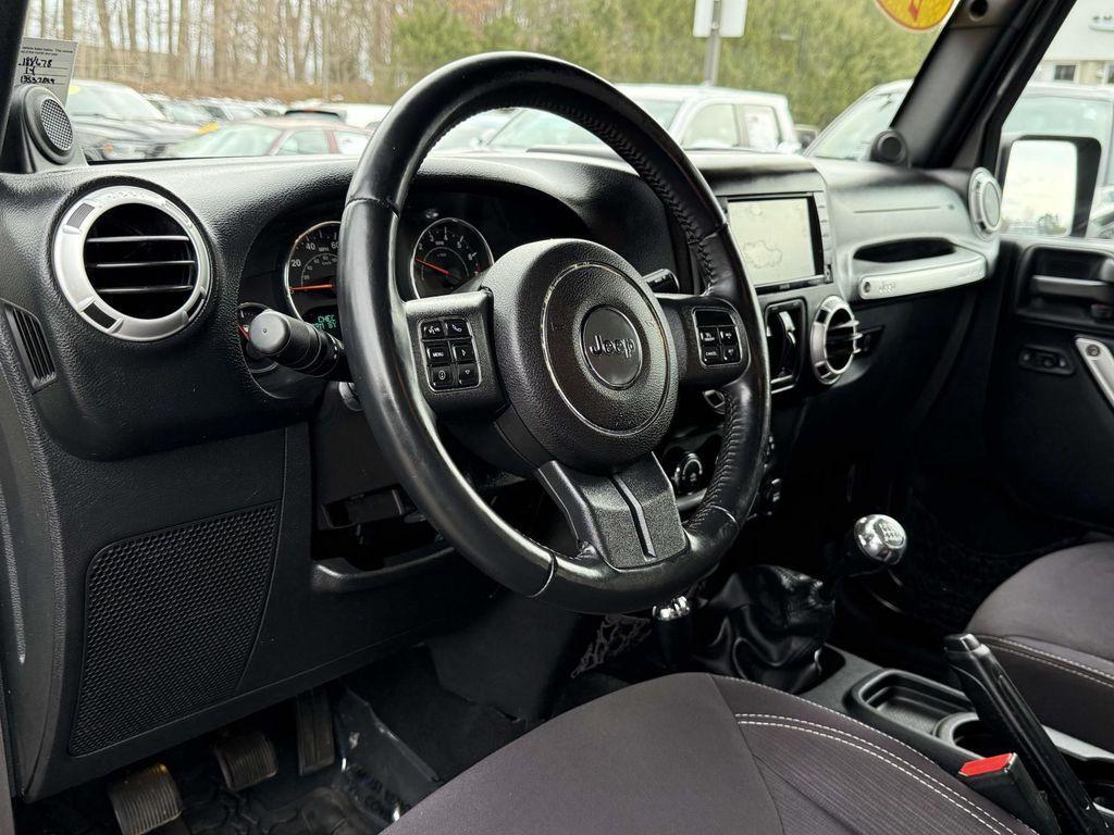 used 2014 Jeep Wrangler Unlimited car, priced at $17,844