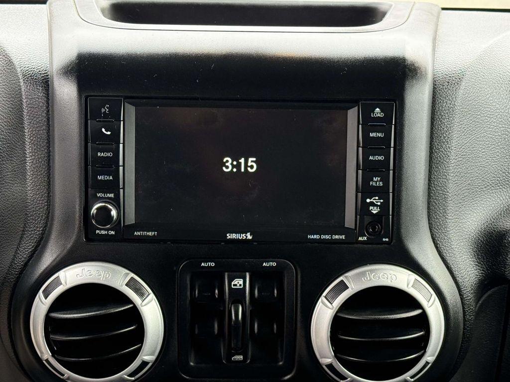 used 2014 Jeep Wrangler Unlimited car, priced at $17,844