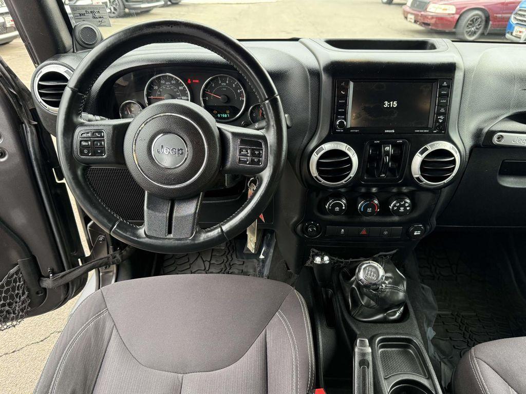 used 2014 Jeep Wrangler Unlimited car, priced at $17,844