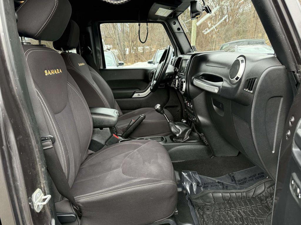 used 2014 Jeep Wrangler Unlimited car, priced at $17,844