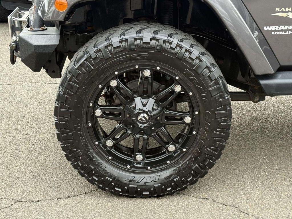 used 2014 Jeep Wrangler Unlimited car, priced at $17,844