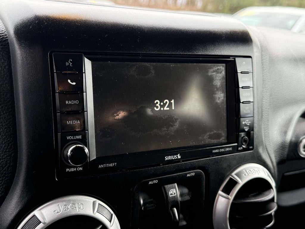 used 2014 Jeep Wrangler Unlimited car, priced at $17,844